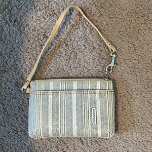 Small Coach wristlet.